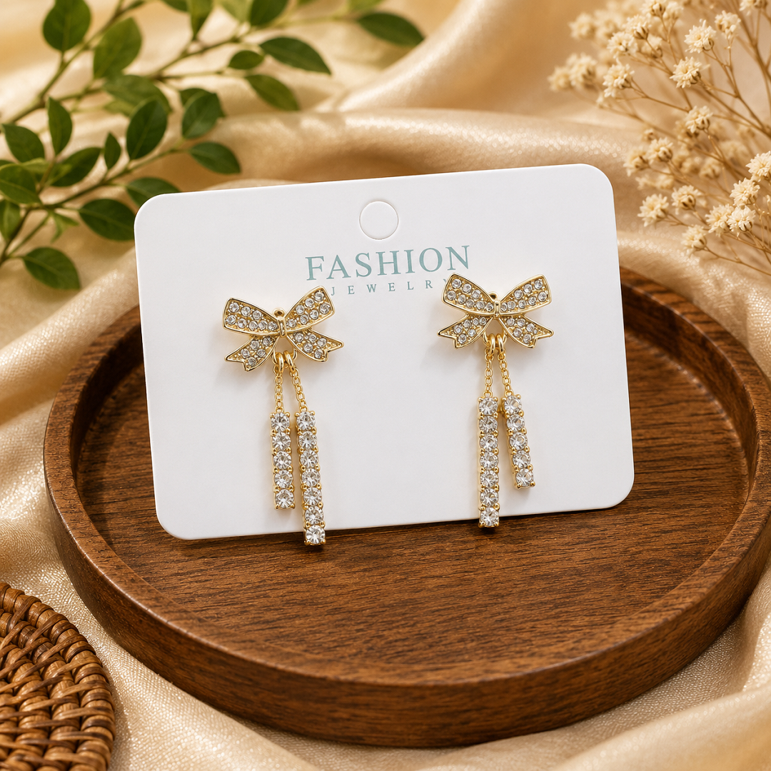 Premium Bow Tassel Crystal Earrings – Gold Finish | Wholesale Price ₹360 (Pack of 6 Pairs)